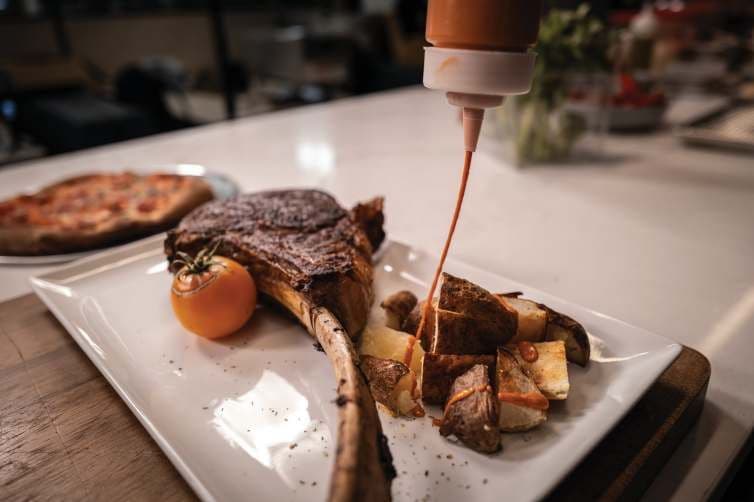 Plated steak with sauce
