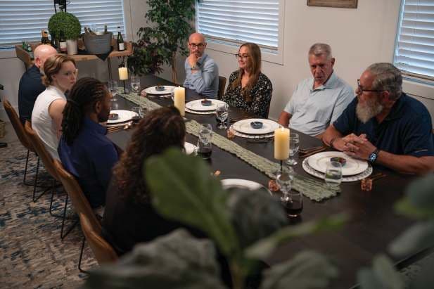 Guests at the roundtable dinner